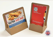 Cardboard stand with printed food menu and contact information on a white background